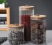 Glass container bamboo lid with golden pull ring